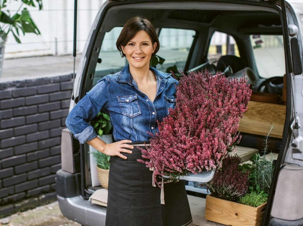 a woman with floral business
